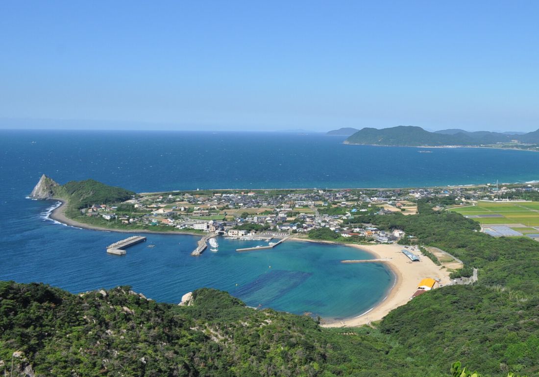 The Itoshima coast seen from Tateishi-yama — the fishing harbour, Keya beach, and the Genkai Sea beyond.